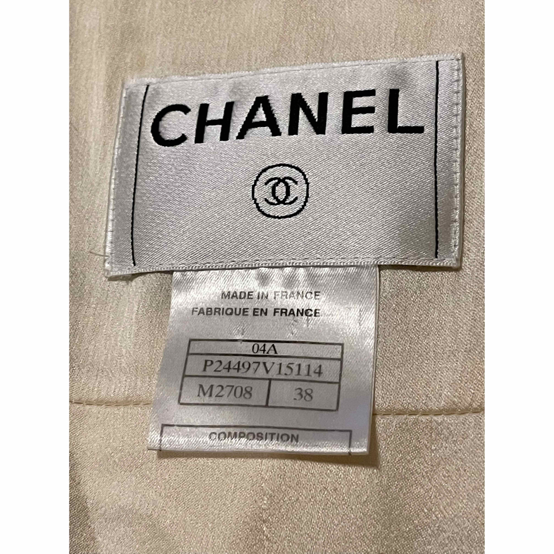 CHANEL(シャネル)のCHANEL シャネル　ツィードコート38 カメリア　フリンジ　オフホワイト レディースのジャケット/アウター(ロングコート)の商品写真