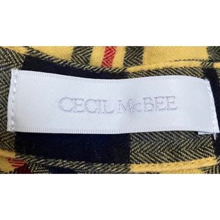 セシルマクビー(CECIL McBEE)の黄色チェック柄シャツ(シャツ/ブラウス(長袖/七分))