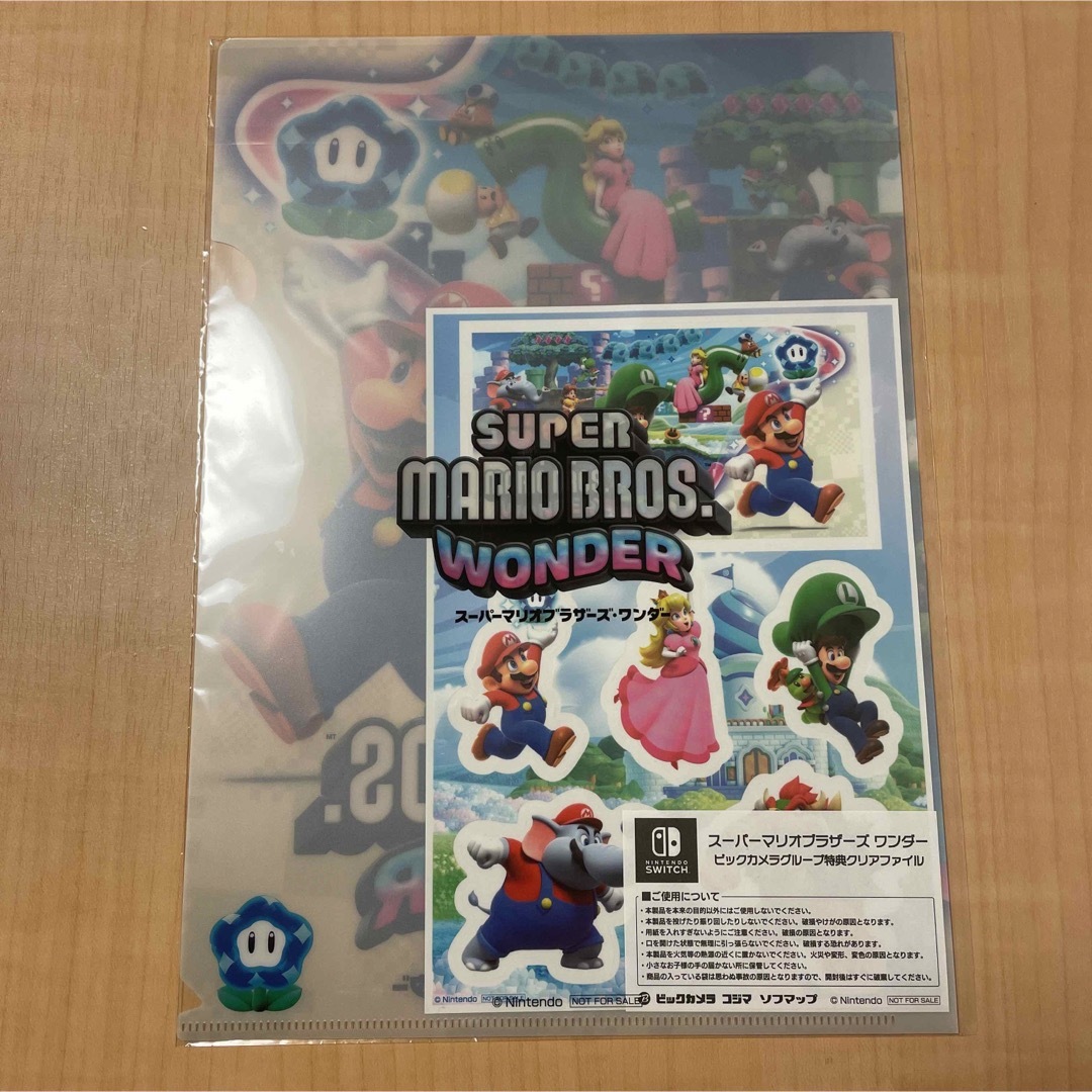 Nintendo Switch(ニンテンドースイッチ)のスーパーマリオブラザーズ ワンダー 特典 A4クリアファイル キャラクターシール エンタメ/ホビーのアニメグッズ(クリアファイル)の商品写真