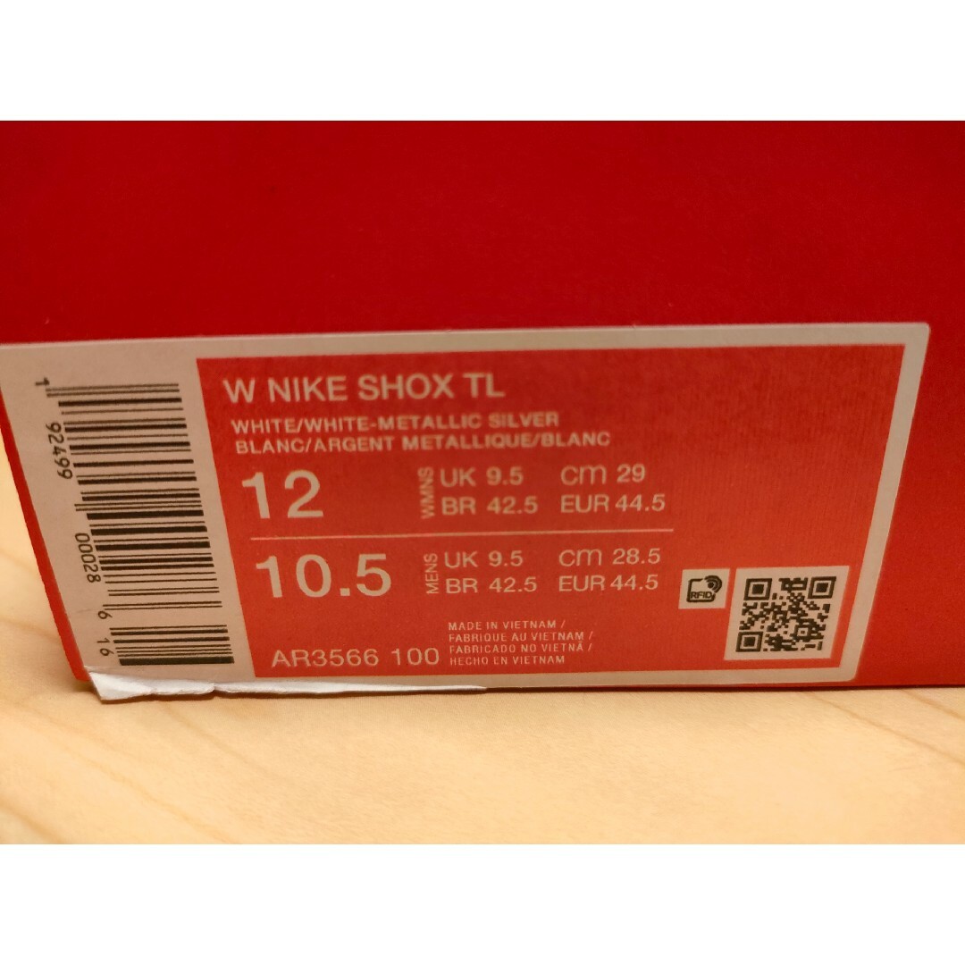 NIKE(ナイキ)のナイキ ウィメンズ ショックス TL "ホワイト アンド マックスオレンジ" メンズの靴/シューズ(スニーカー)の商品写真