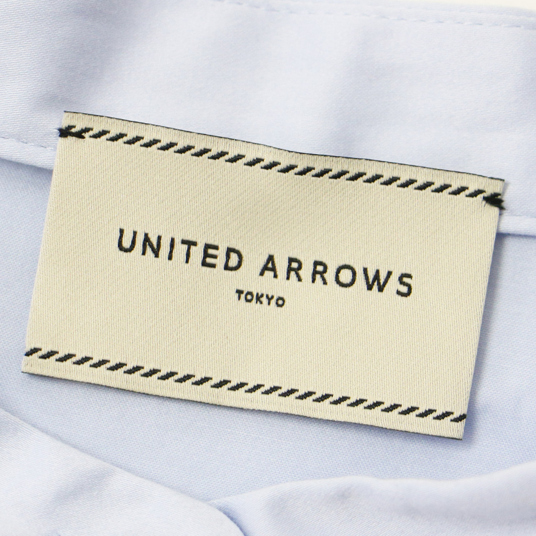 UNITED ARROWS(ユナイテッドアローズ)のUNITED ARROWS ユナイテッドアローズ ブラウス トップス ライトブルー FREE 半袖 バンドカラー ペプラム フレア フリル ラッフル コットン 綿 おしゃれ シンプル 無地 きれいめ 大人女子 ブランド 上品 ベーシック オフィスカジュアル【レディース】【中古】 レディースのトップス(シャツ/ブラウス(半袖/袖なし))の商品写真