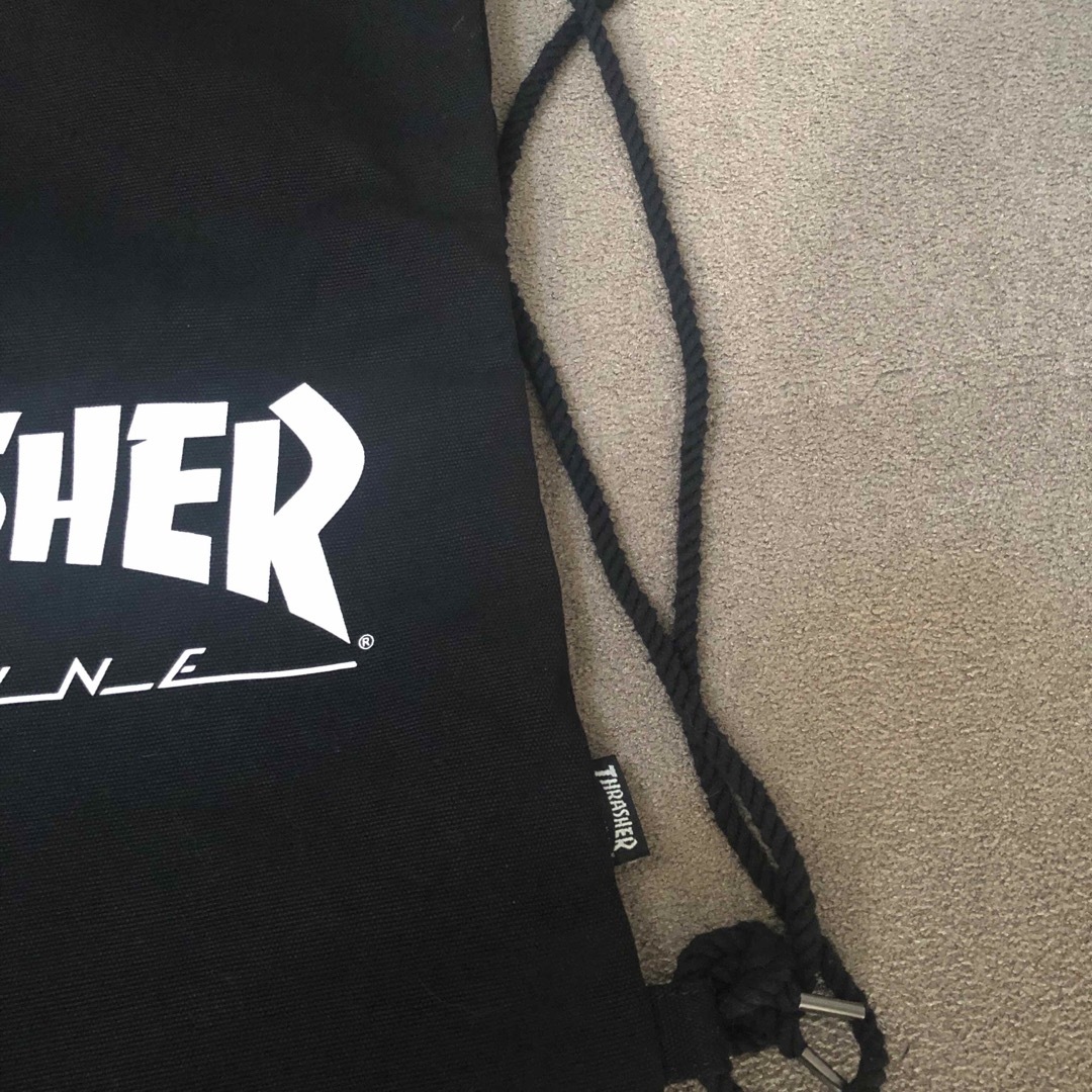 THRASHER(スラッシャー)の新品未使用THRASHERスラッシャー ナップサック リュック バッグ お洒落 レディースのバッグ(リュック/バックパック)の商品写真