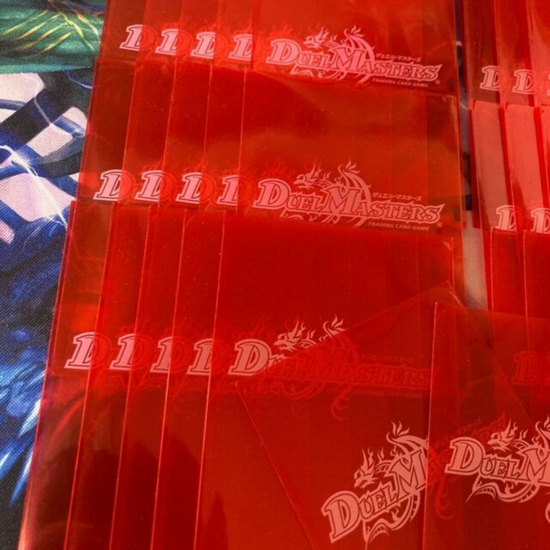 デュエルマスターズ(デュエルマスターズ)の旧公式スリーブ 赤 スケルトン 42枚 エンタメ/ホビーのトレーディングカード(シングルカード)の商品写真