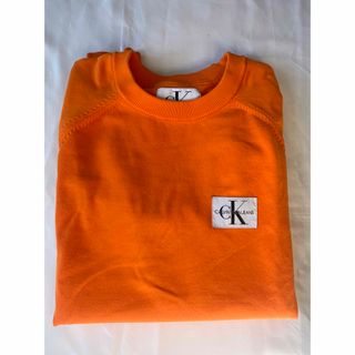 カルバンクライン(Calvin Klein)のCalvin Klein Jeans スウェットシャツ　オレンジ(スウェット)