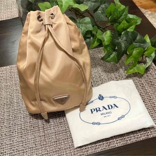 プラダ(PRADA)のPRADA プラダ 巾着 ベージュ 布袋付き 未使用 美品(ポーチ)