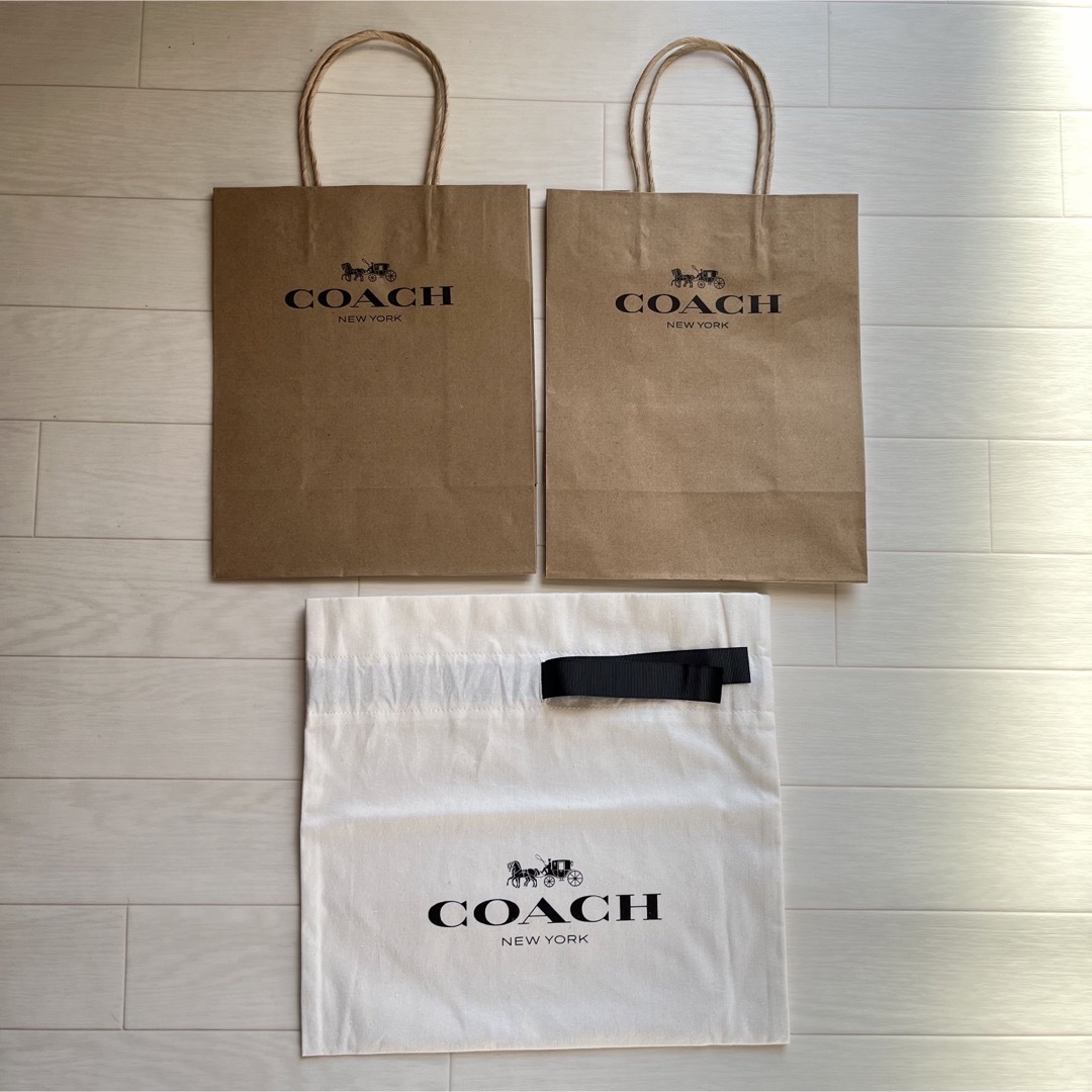 COACH(コーチ)の【美品】coach コーチ　ショップバック　巾着 レディースのバッグ(ショップ袋)の商品写真