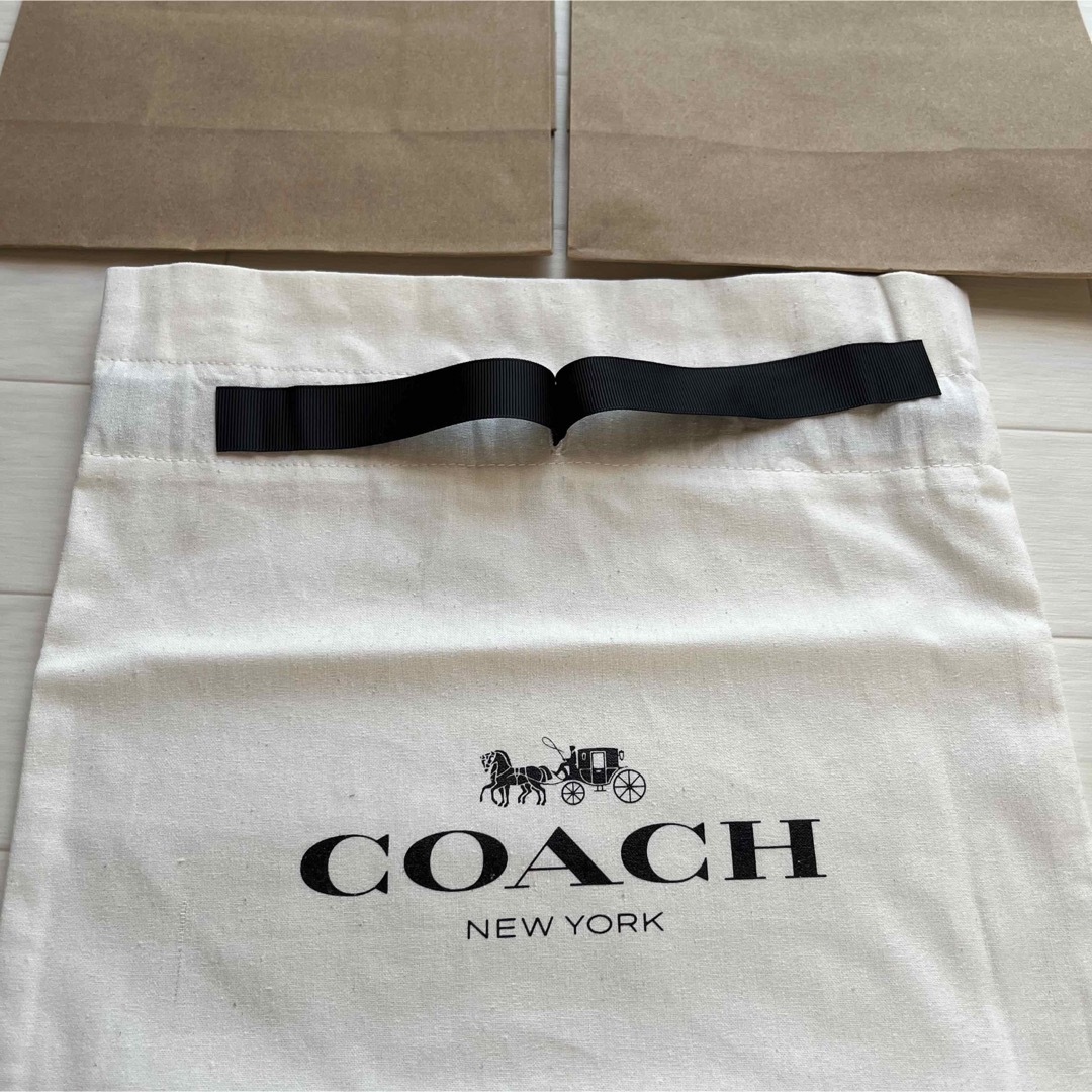 COACH(コーチ)の【美品】coach コーチ　ショップバック　巾着 レディースのバッグ(ショップ袋)の商品写真