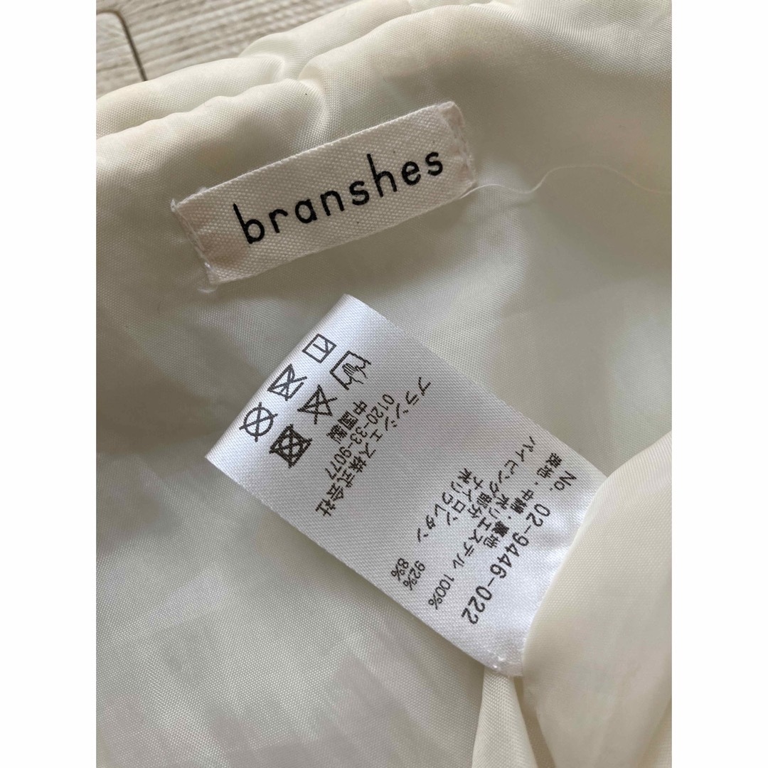 Branshes(ブランシェス)のブランシェス　ジャンプスーツ　カバーオール　中綿　白　リボン キッズ/ベビー/マタニティのベビー服(~85cm)(ジャケット/コート)の商品写真