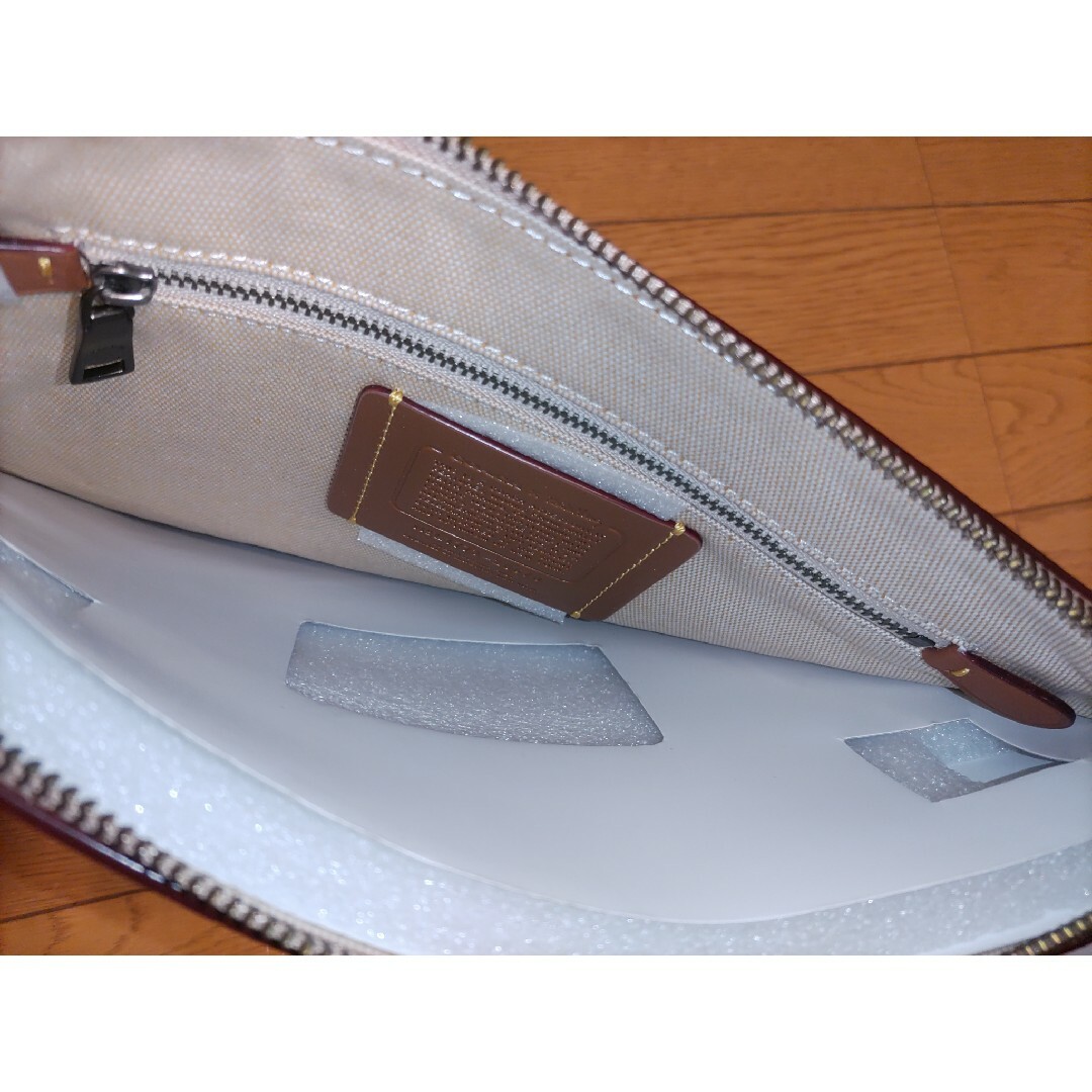 COACH レザーラージ クラッチバッグ キース・へリング　未使用　アウトレット メンズのバッグ(セカンドバッグ/クラッチバッグ)の商品写真