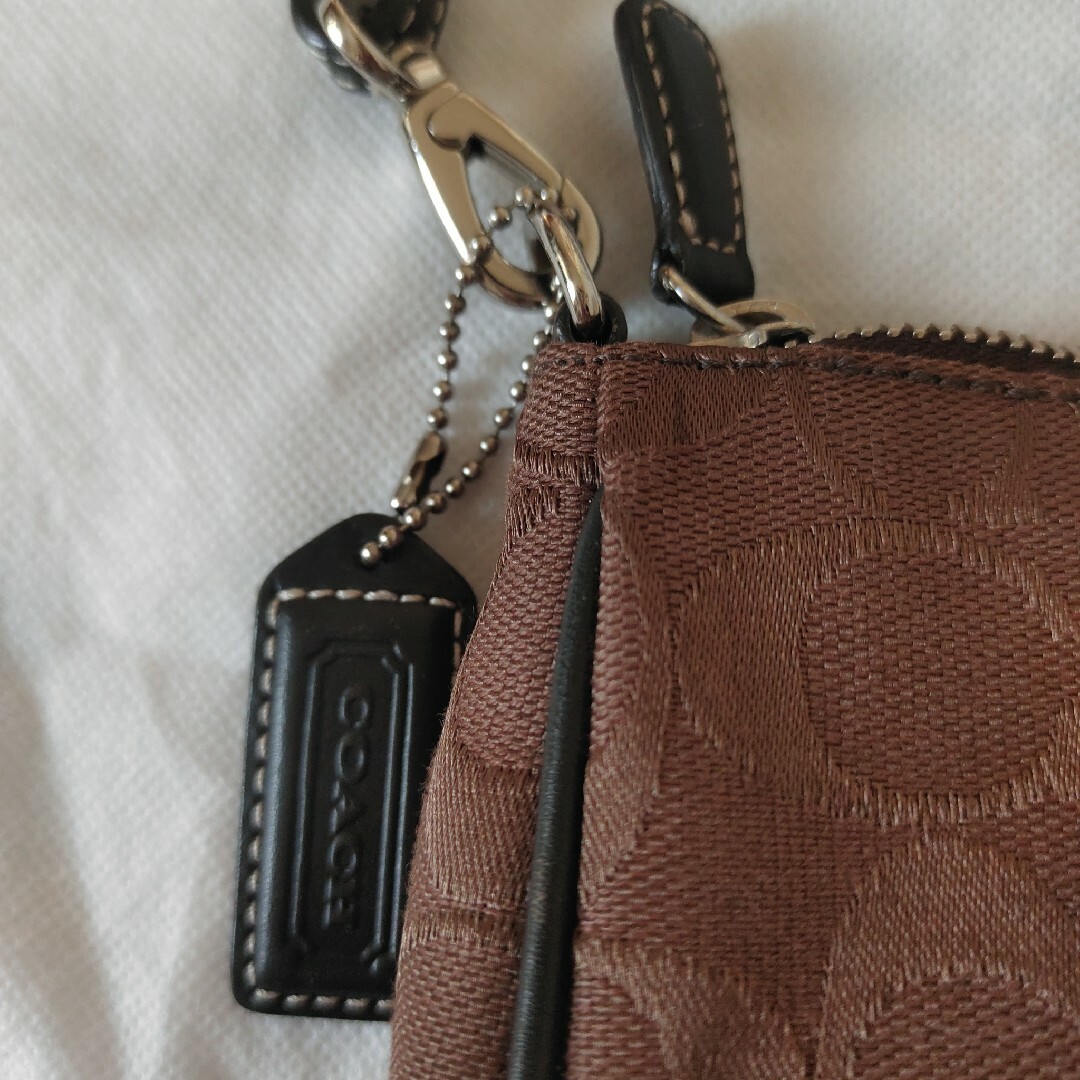 COACH(コーチ)のCOACH コーチ アクセサリーポーチ ハンドバッグ/キャンバス/BRW レディースのバッグ(ショルダーバッグ)の商品写真