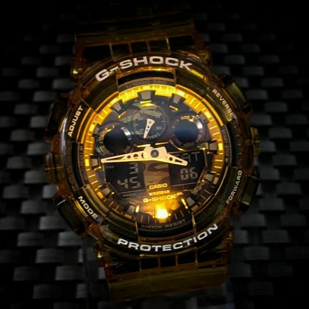 CASIO(カシオ)のG-SHOCK GA-100 キャンディイエロー (オレンジ) [電池新品] メンズの時計(腕時計(アナログ))の商品写真