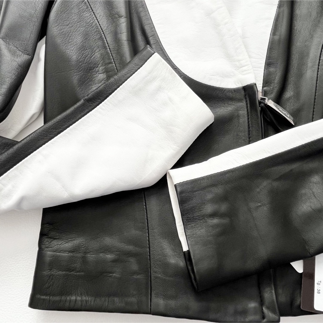 BYBLOS(ビブロス)の新品タグ付✨byblos レザー ノーカラー ジャケット 白 黒 S イタリア製 レディースのジャケット/アウター(ノーカラージャケット)の商品写真