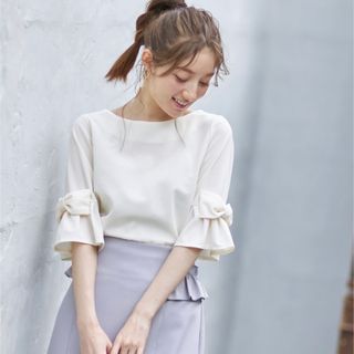 トッコクローゼット(TOCCO closet)のtocco りぼん付き袖口フレアカットプルオーバー(シャツ/ブラウス(長袖/七分))