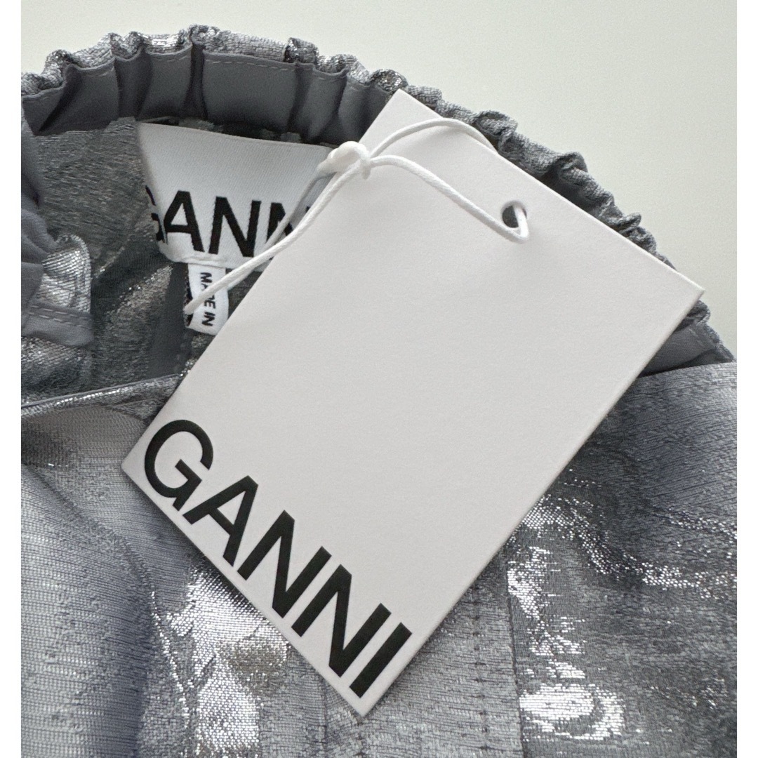 Adam et Rope'(アダムエロぺ)の【新品】GANNI ガニー　メタリック　トップス　シャツ レディースのトップス(シャツ/ブラウス(長袖/七分))の商品写真