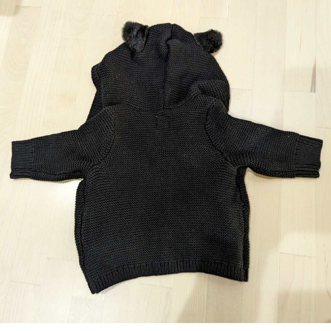 babyGAP(ベビーギャップ)のGAP ニット カーディガン 黒 ねこ 50サイズ キッズ/ベビー/マタニティのベビー服(~85cm)(カーディガン/ボレロ)の商品写真