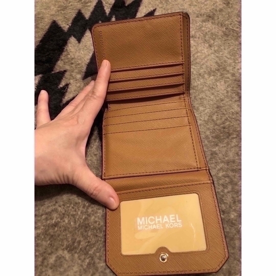 Michael Kors(マイケルコース)の値下げ中 確実正規品 MICHEAL KORS シグネチャー柄 短財布 レディースのファッション小物(財布)の商品写真