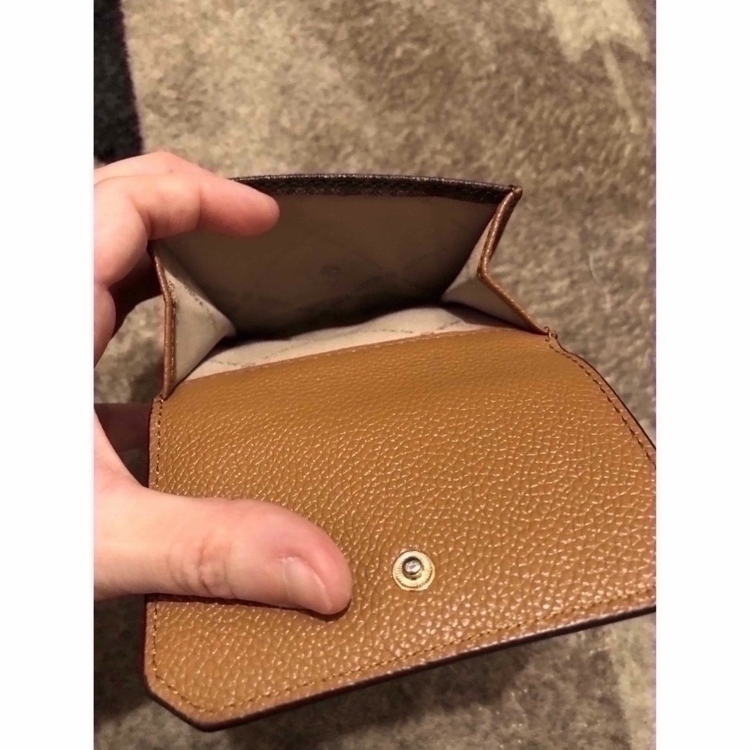 Michael Kors(マイケルコース)の値下げ中 確実正規品 MICHEAL KORS シグネチャー柄 短財布 レディースのファッション小物(財布)の商品写真