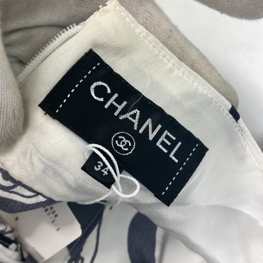 34総丈シャネル CHANEL カメリア 総柄 アイコン P71863 CC ココマーク 22P スカート シルク ホワイト