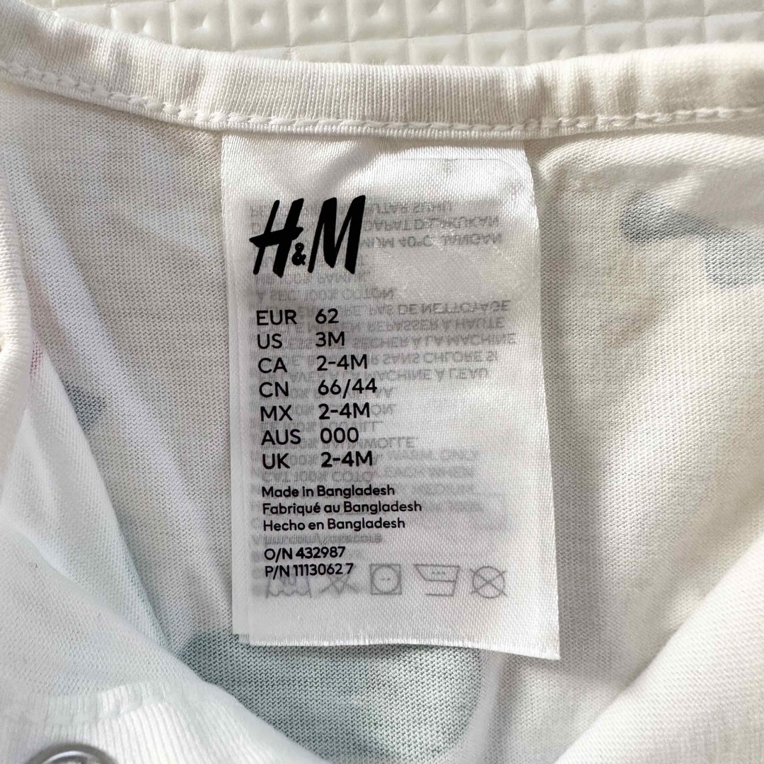 H&M(エイチアンドエム)のH&M プリントコットンパジャマ ベビー ロンパース 62cm 3m キッズ/ベビー/マタニティのベビー服(~85cm)(ロンパース)の商品写真