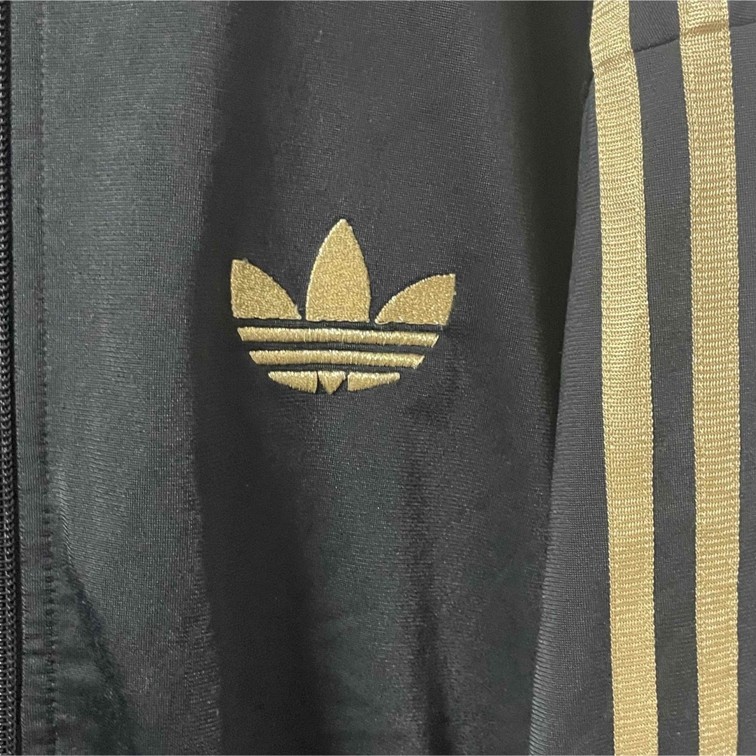 adidasアディダス 黒×金トラックジャケット ジャージ トレフォイルロゴ L