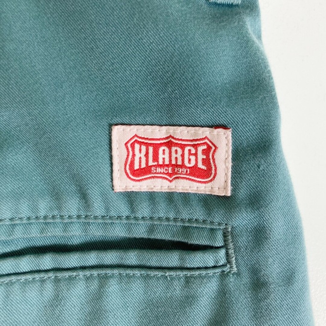 XLARGE(エクストララージ)の★X-LARGE エクストララージ PAINTED WORK PANTS ペイント ワークパンツ グリーン size34 メンズのパンツ(その他)の商品写真