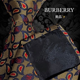 バーバリー(BURBERRY)の【美品】 BURBERRY 暗めのゴールド系 ロゴ柄 ペイズリー柄(ネクタイ)