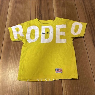 ロデオクラウンズワイドボウル(RODEO CROWNS WIDE BOWL)のロデオ　イエロー　ロゴTシャツ　ベビーキッズサイズ　S(Tシャツ/カットソー)