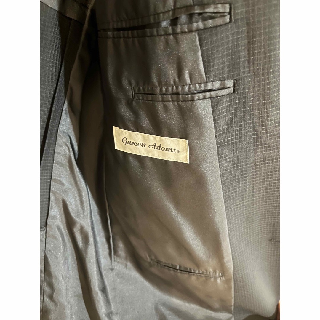 青山(アオヤマ)のクリーニング済渡し　美品　形態安定3ボタンジャケット　黒格子柄　AB5 メンズのジャケット/アウター(テーラードジャケット)の商品写真