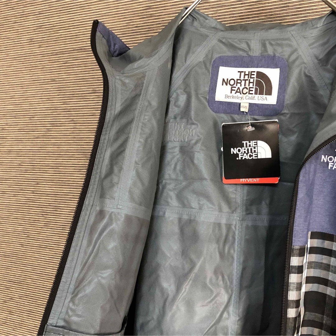 THE NORTH FACE(ザノースフェイス)の【未使用品ノースフェイス】ポンチョ　ハイベント　レインジャケット　チェック紫 レディースのジャケット/アウター(ポンチョ)の商品写真