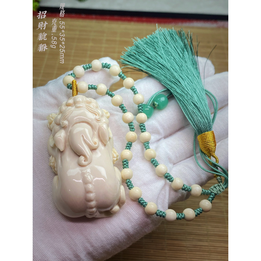 天然マンモス牙精巧な手作り彫刻金運を招き貔貅握り物 天然マンモス牙精巧な手作り彫刻金運を招き貔貅握り物