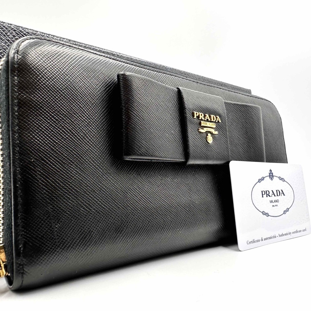✨美品✨プラダ 長財布 ラウンドジップ リボン ロゴ金具 レザー ブラック-