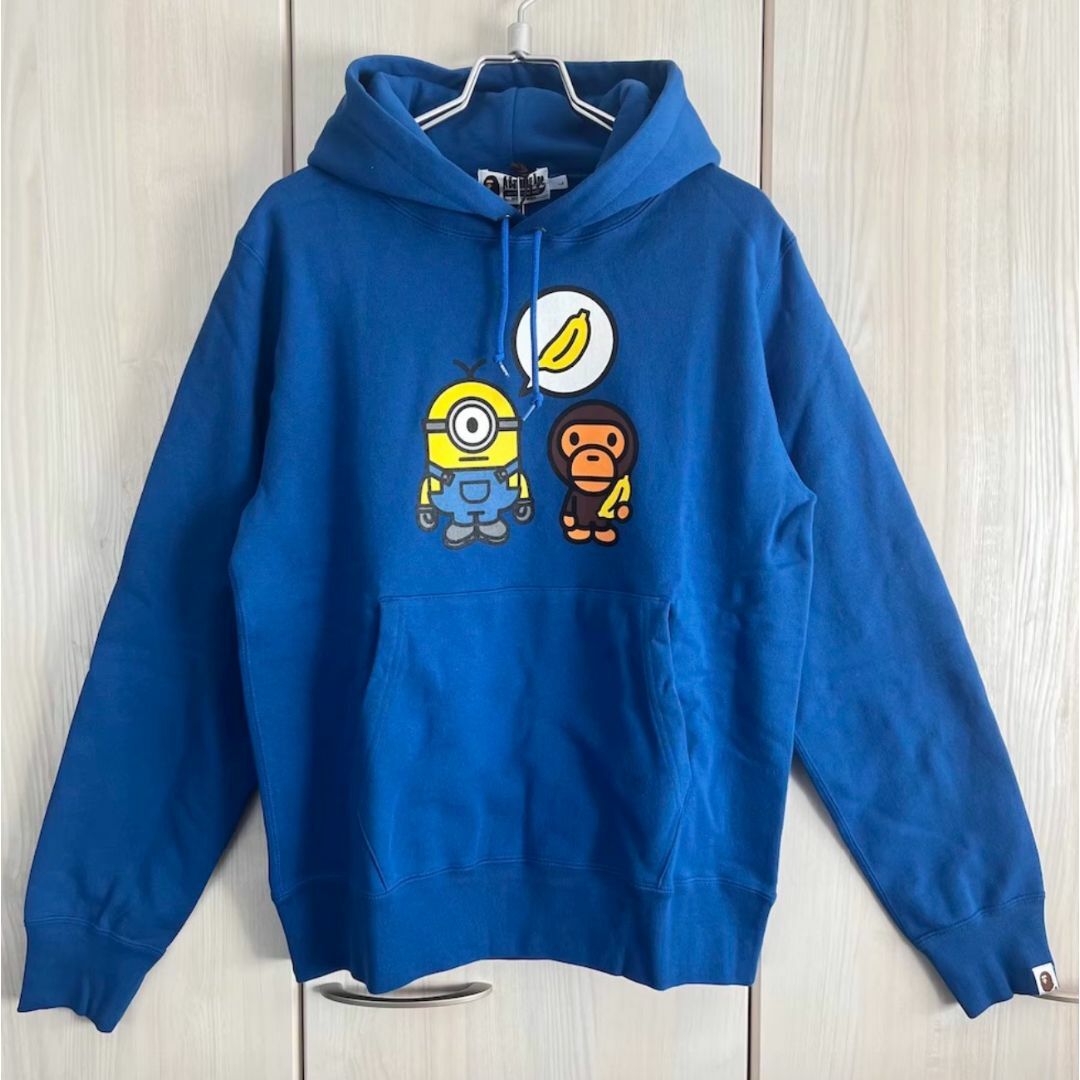 A BATHING APE(アベイシングエイプ)のBAPE X MINIONS コラボ パーカープルオーバーブルー MILO 即納 メンズのトップス(パーカー)の商品写真