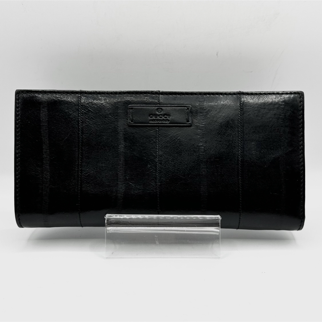 希少 GUCCI 二つ折り財布 イールスキン ブランドロゴ 型押し ブラック