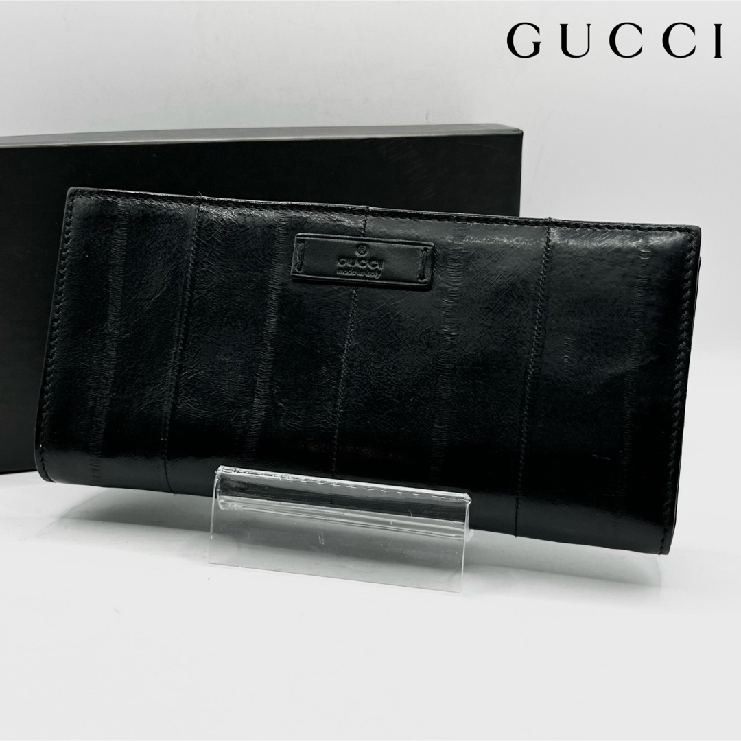 希少 GUCCI 二つ折り財布 イールスキン ブランドロゴ 型押し ブラック | フリマアプリ ラクマ