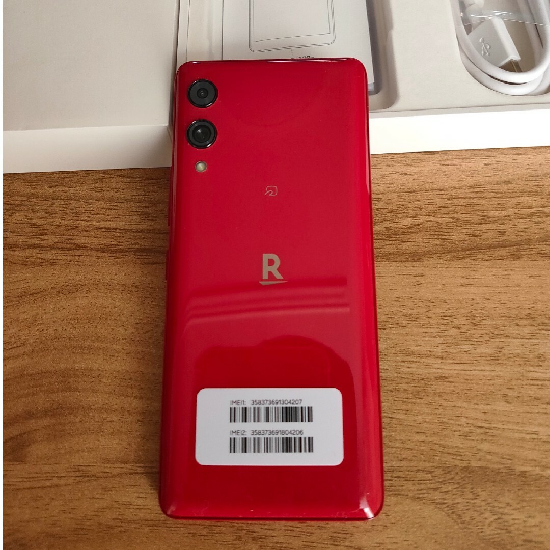 Rakuten(ラクテン)のRakuten Hand 5G クリムゾンレッド 128 GB SIMフリー スマホ/家電/カメラのスマートフォン/携帯電話(スマートフォン本体)の商品写真