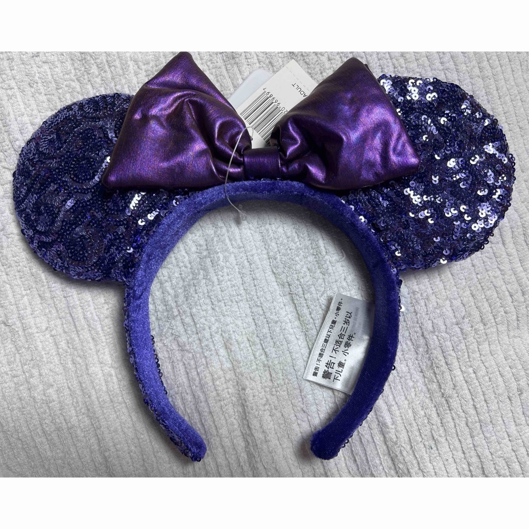 Disney(ディズニー)の新品 海外 ディズニー カチューシャ 紫 エンタメ/ホビーのおもちゃ/ぬいぐるみ(キャラクターグッズ)の商品写真