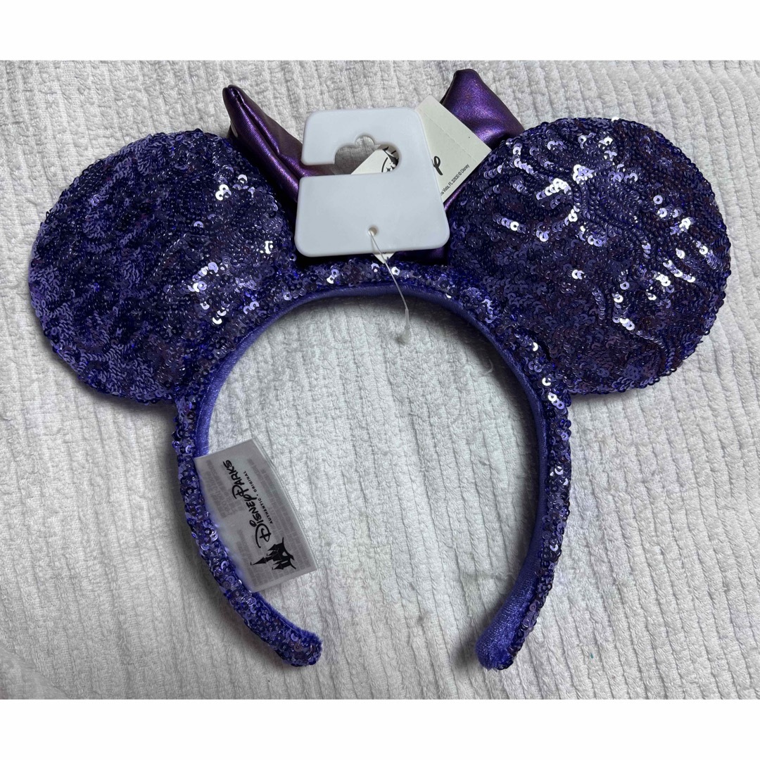 Disney(ディズニー)の新品 海外 ディズニー カチューシャ 紫 エンタメ/ホビーのおもちゃ/ぬいぐるみ(キャラクターグッズ)の商品写真