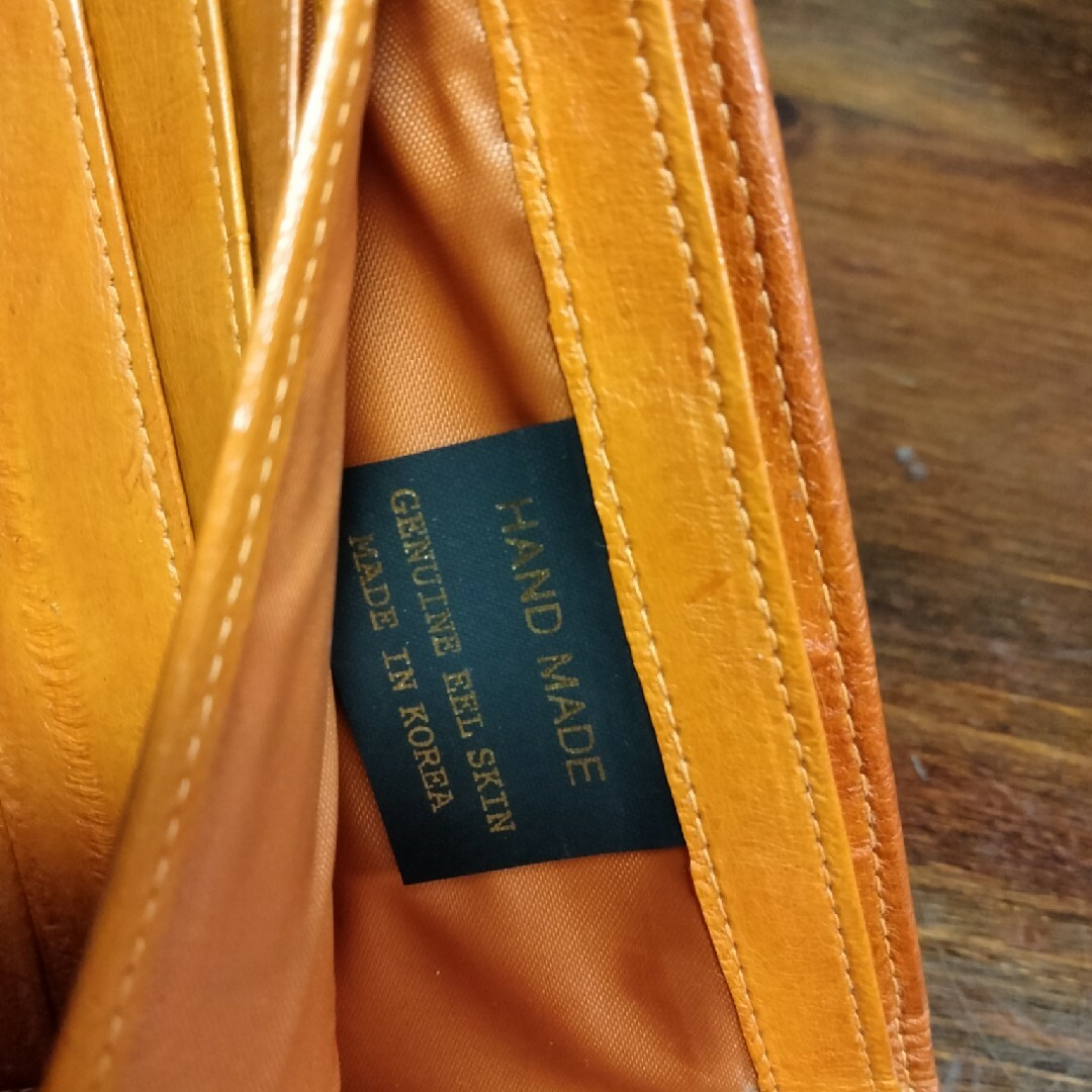 うなぎの皮　財布　折り財布　韓国土産　オレンジ　茶 メンズのファッション小物(折り財布)の商品写真