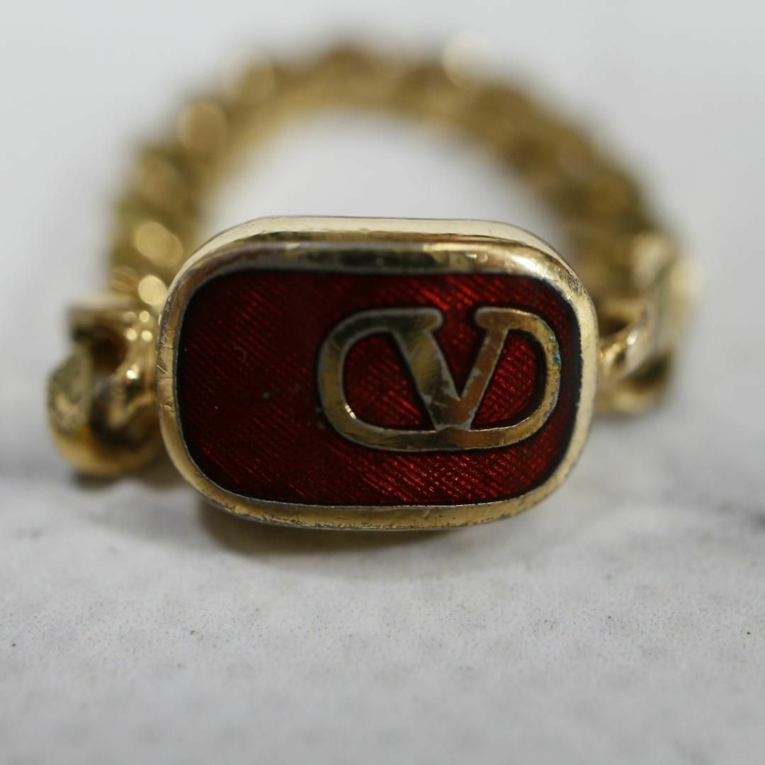VALENTINO(ヴァレンティノ)の【匿名配送】ヴァレンティノ リング 指輪 15号 ゴールド ロゴ 赤 レディースのアクセサリー(リング(指輪))の商品写真