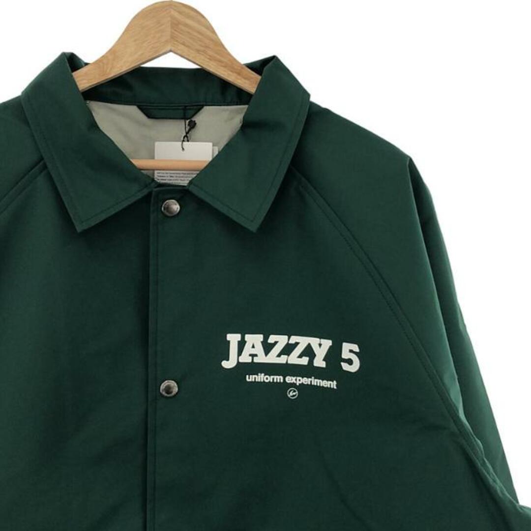 uniform experiment(ユニフォームエクスペリメント)の【新品】  uniform experiment / ユニフォームエクスペリメント | FRAGMENT : JAZZY JAY / JAZZY 5 COACH JACKET コーチジャケット | 4 | グリーン | メンズ メンズのジャケット/アウター(その他)の商品写真