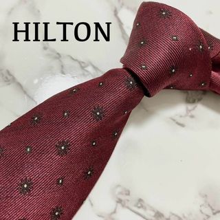 ヒルトンタイム(HILTON TIME)の【未使用タグ付き】ネクタイ ヒルトン 紋様柄 ジャガード シルク ボルドー(ネクタイ)