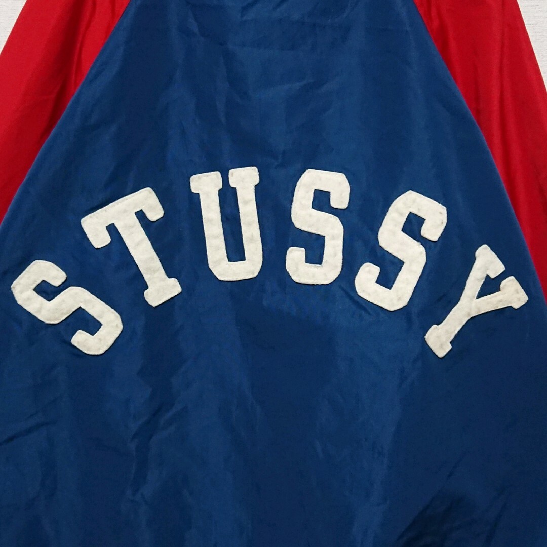 STUSSY(ステューシー)のステューシー バック アーチ ロゴ 切り替え ナイロン コーチ ジャケット メンズのジャケット/アウター(ナイロンジャケット)の商品写真