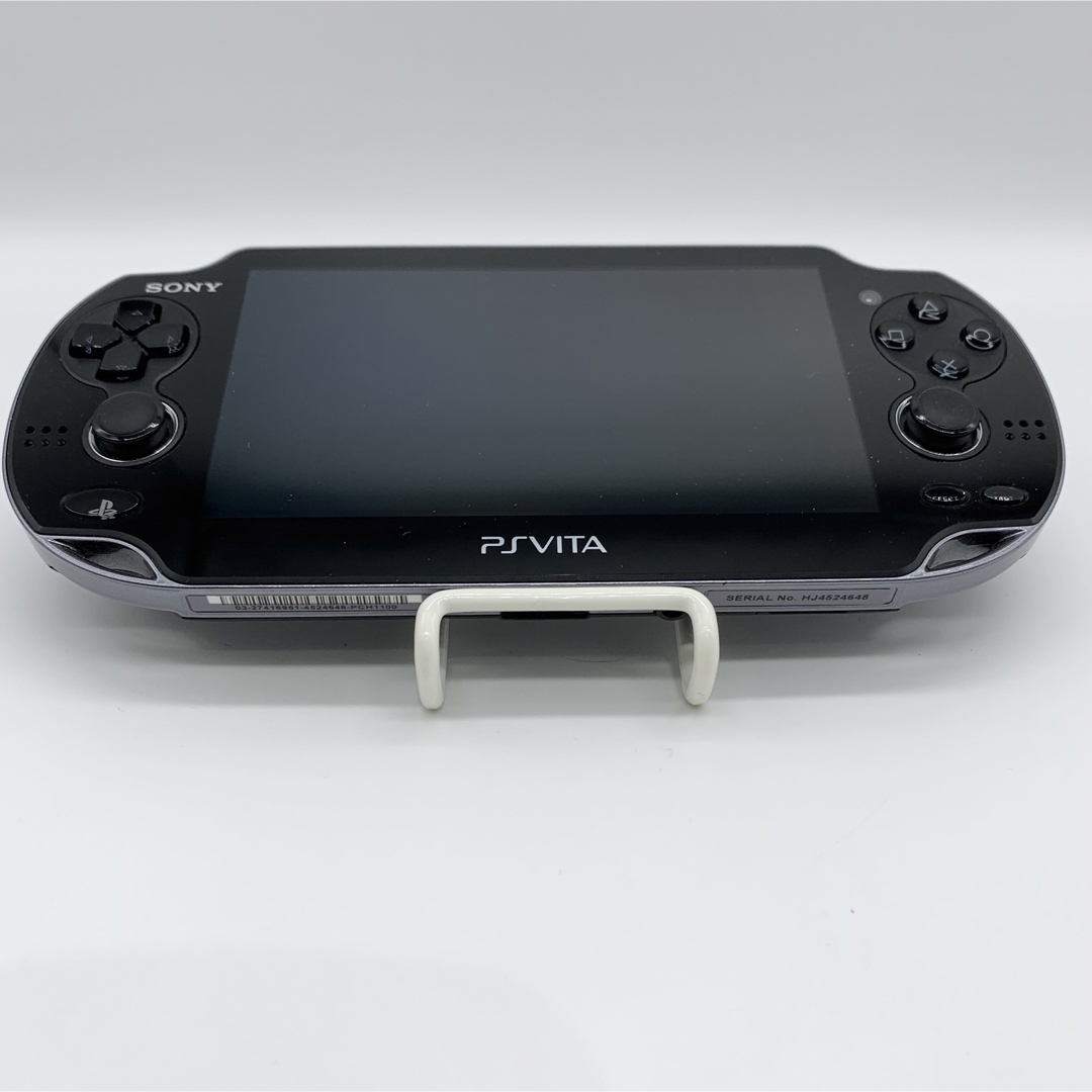 PlayStation Vita(プレイステーションヴィータ)の【完品・液晶美品】PS Vita PCH-1100 ブラック 本体 動作品 エンタメ/ホビーのゲームソフト/ゲーム機本体(携帯用ゲーム機本体)の商品写真