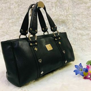 エムシーエム(MCM)の【極美品】エムシーエム ハンドバッグ ロゴ金具 スタッズ レザー シボ革(ハンドバッグ)