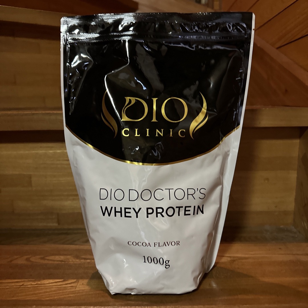 DIOクリニック プロテイン ココア味 専用スプーン付 食品/飲料/酒の健康食品(プロテイン)の商品写真