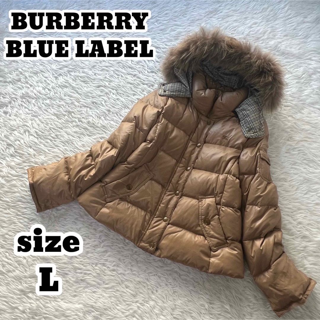 BURBERRY BLUE LABEL(バーバリーブルーレーベル)のバーバリーブルーレーベル ダウンコート ノバチェック たぬきファー キャメル レディースのジャケット/アウター(ダウンコート)の商品写真