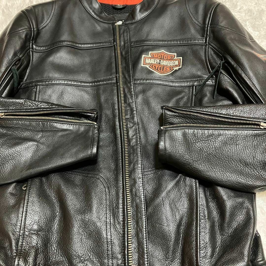 Harley Davidson(ハーレーダビッドソン)の【最高デザイン】HARLEY DAVIDSON レザーライダース　アームロゴ　L メンズのジャケット/アウター(ライダースジャケット)の商品写真