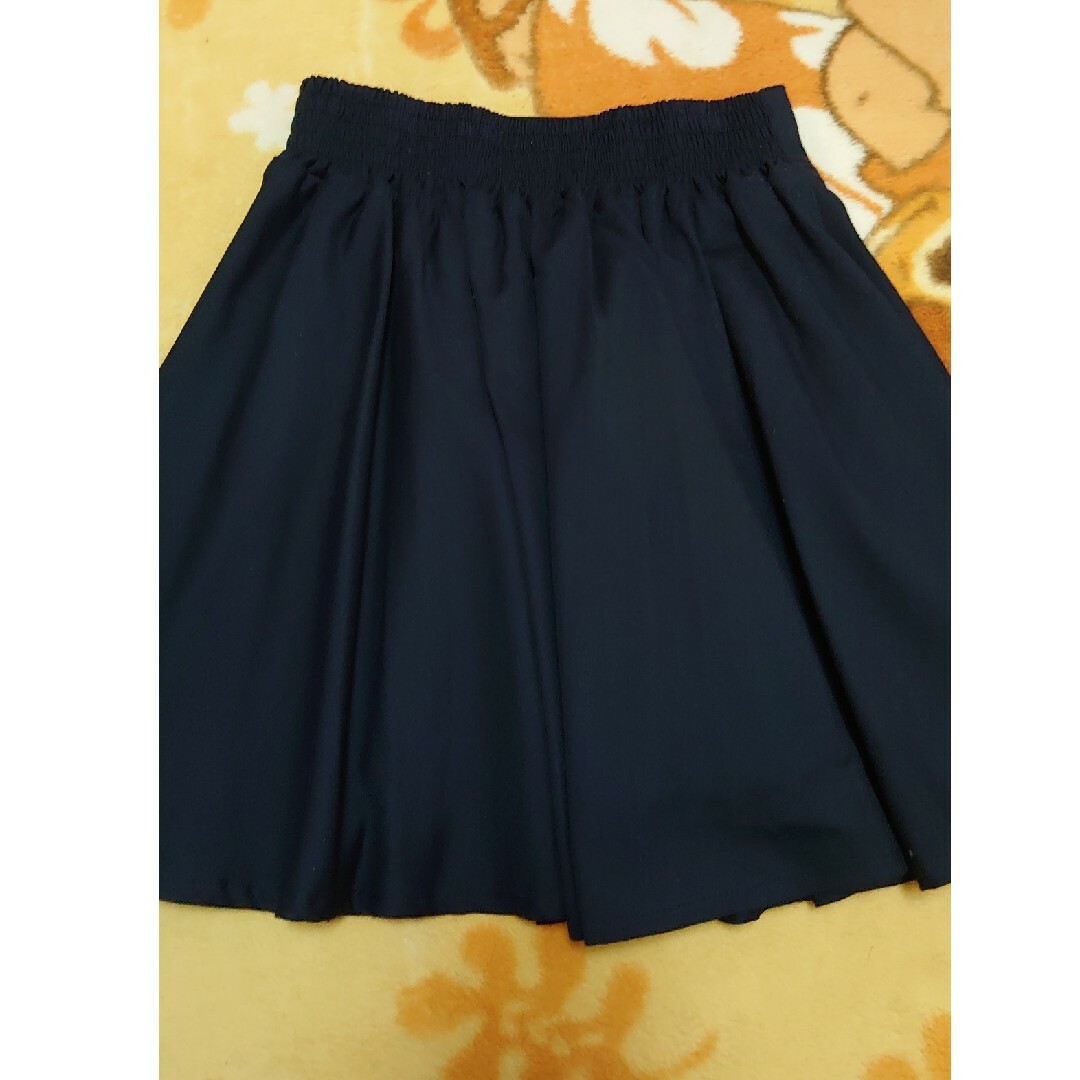 COLZA(コルザ)の紺　スカート レディースのスカート(ひざ丈スカート)の商品写真