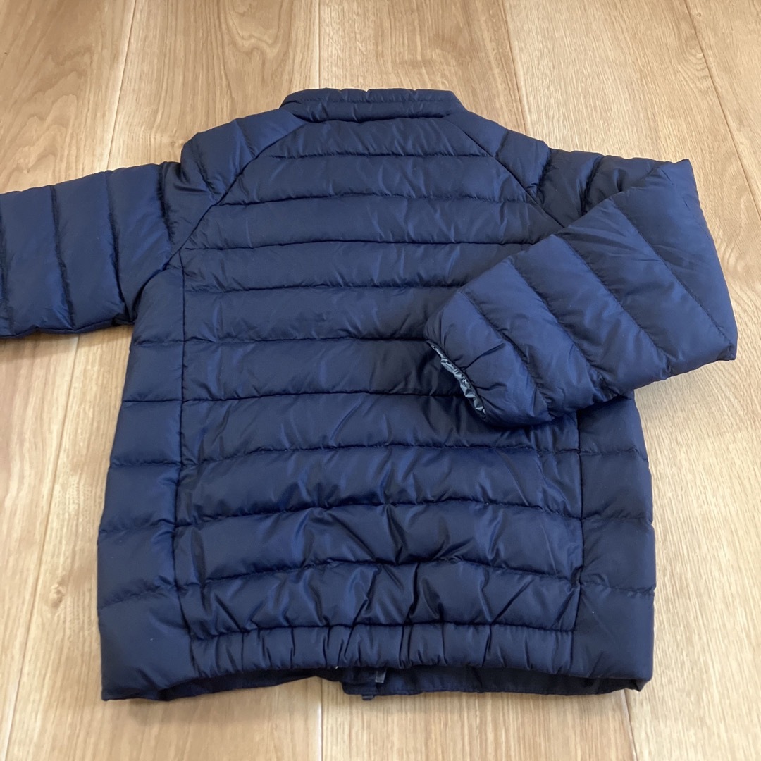 patagonia(パタゴニア)の【新品】5T ベビー・ダウン・セーター パタゴニア キッズ/ベビー/マタニティのキッズ服男の子用(90cm~)(ジャケット/上着)の商品写真