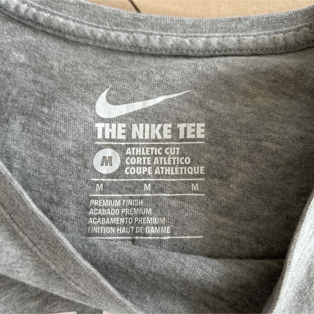 NIKE(ナイキ)のNIKE TシャツM レディースのトップス(Tシャツ(半袖/袖なし))の商品写真